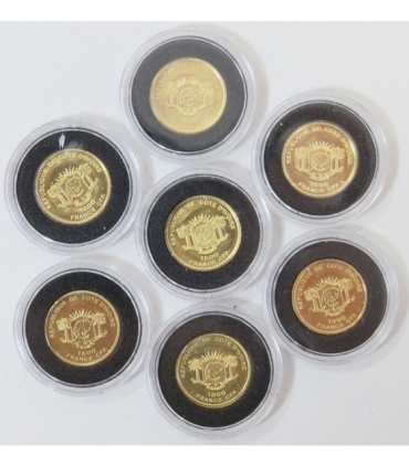Złoto Au917 7 x 1g - Siedem cudów świata, najmniejsze monety świata