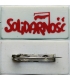 Mała plakietka „Solidarność” z okresu PRL, plastik, przypinka, oryginał